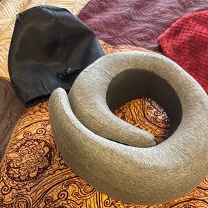 The turtle Travel Neck Pillow with Carry Bag, did not use because I need size am